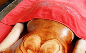 Anwendung: Klassische Rückenmassage mit warmem Schokoladen-Öl für 2 Personen